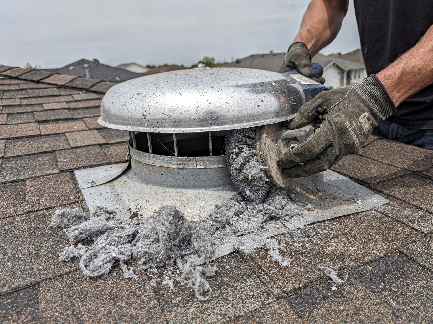 Cleaning Dryer Vent On Roof in Morgan
